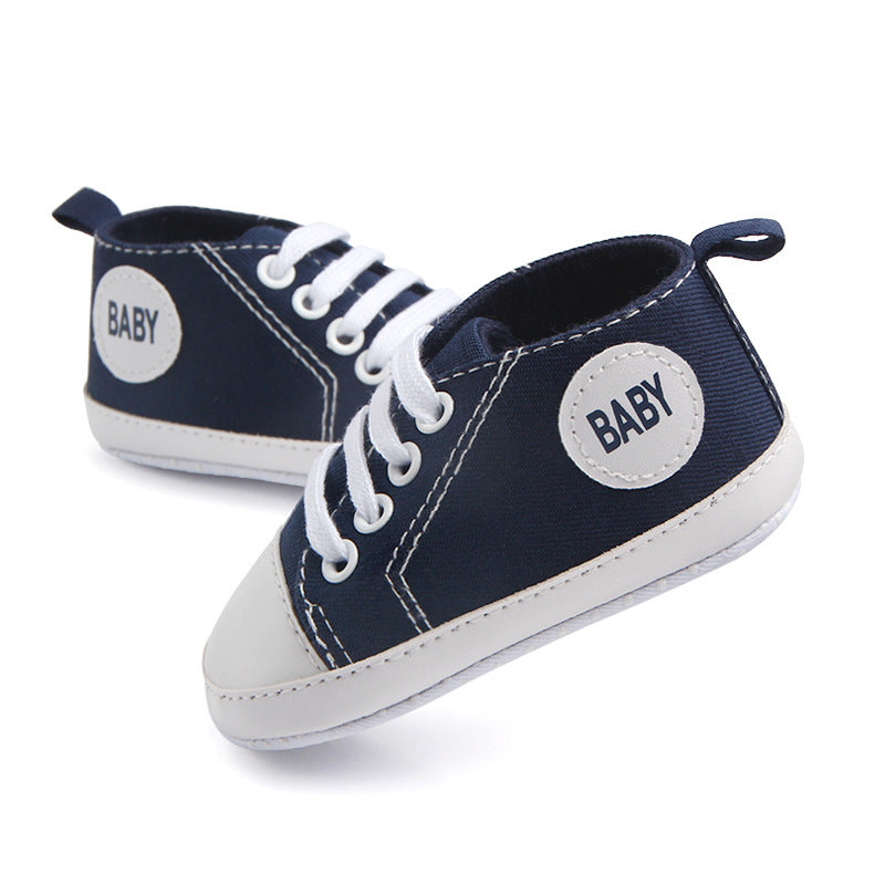 Soft-sole infant sneakers — lightweight, anti-slip shoes for first steps.