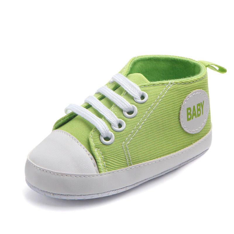 Soft-sole infant sneakers — lightweight, anti-slip shoes for first steps.