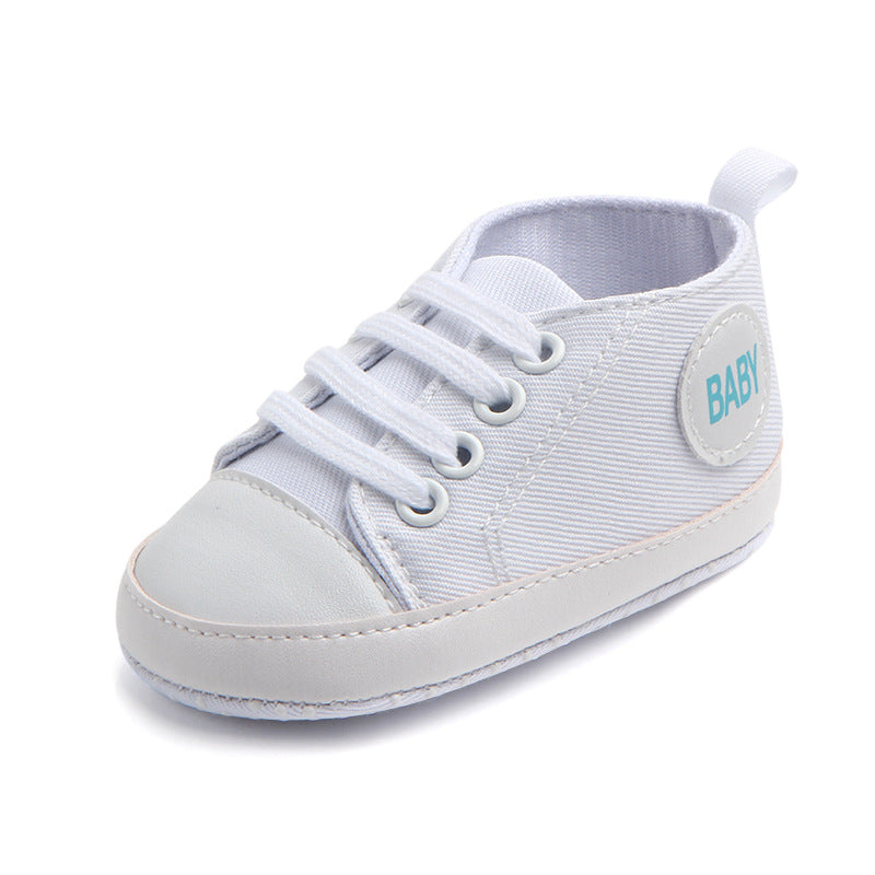 Soft-sole infant sneakers — lightweight, anti-slip shoes for first steps.