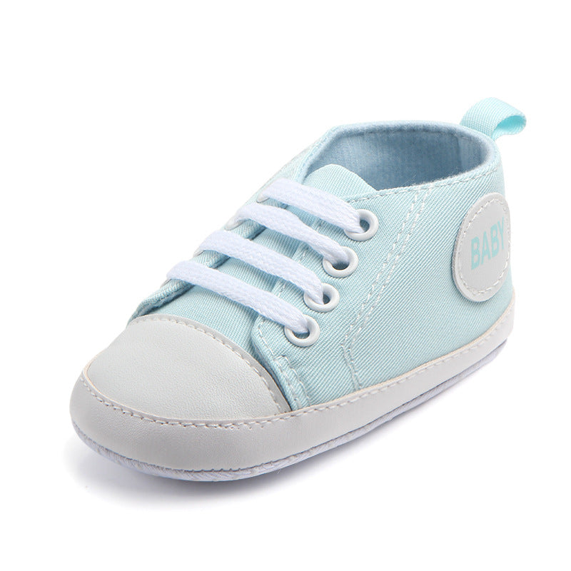 Soft-sole infant sneakers — lightweight, anti-slip shoes for first steps.