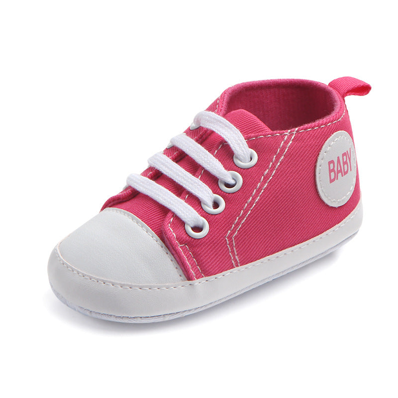 Soft-sole infant sneakers — lightweight, anti-slip shoes for first steps.