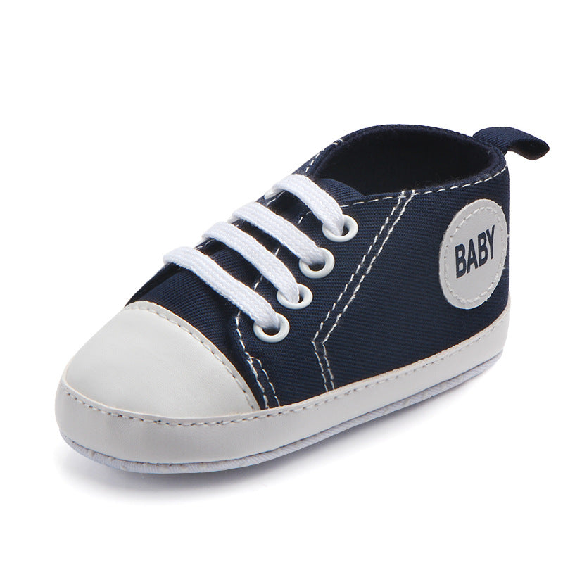 Soft-sole infant sneakers — lightweight, anti-slip shoes for first steps.