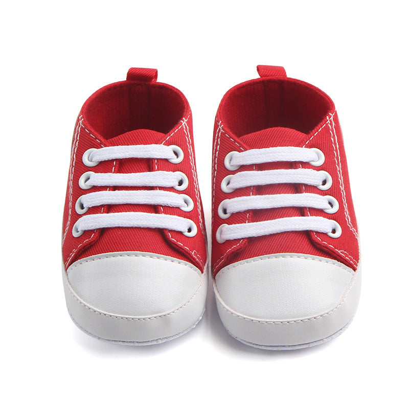 Soft-sole infant sneakers — lightweight, anti-slip shoes for first steps.
