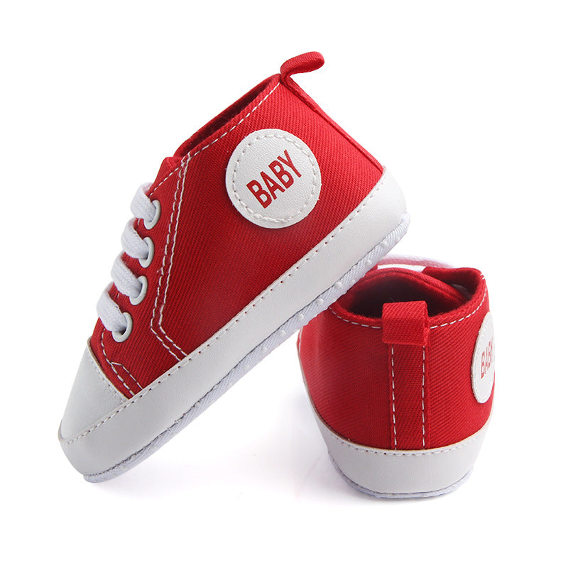 Soft-sole infant sneakers — lightweight, anti-slip shoes for first steps.