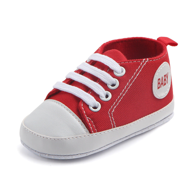 Soft-sole infant sneakers — lightweight, anti-slip shoes for first steps.