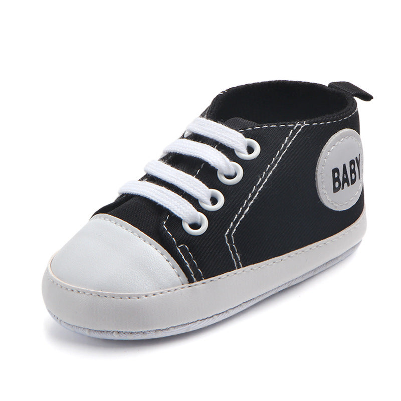 Soft-sole infant sneakers — lightweight, anti-slip shoes for first steps.
